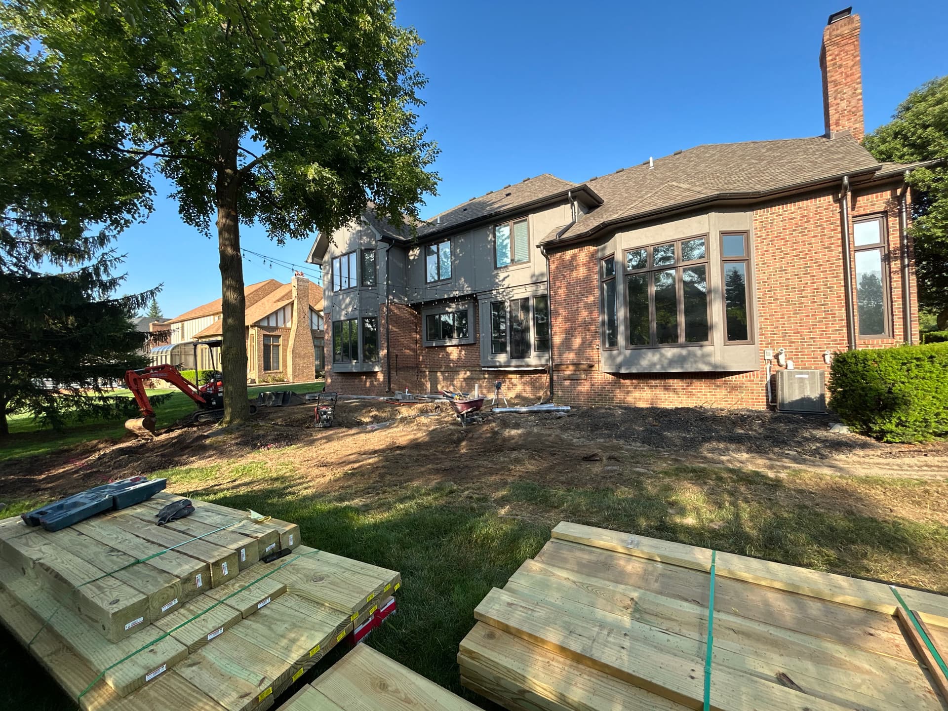 Full Backyard Outdoor Living Build Underway in Troy