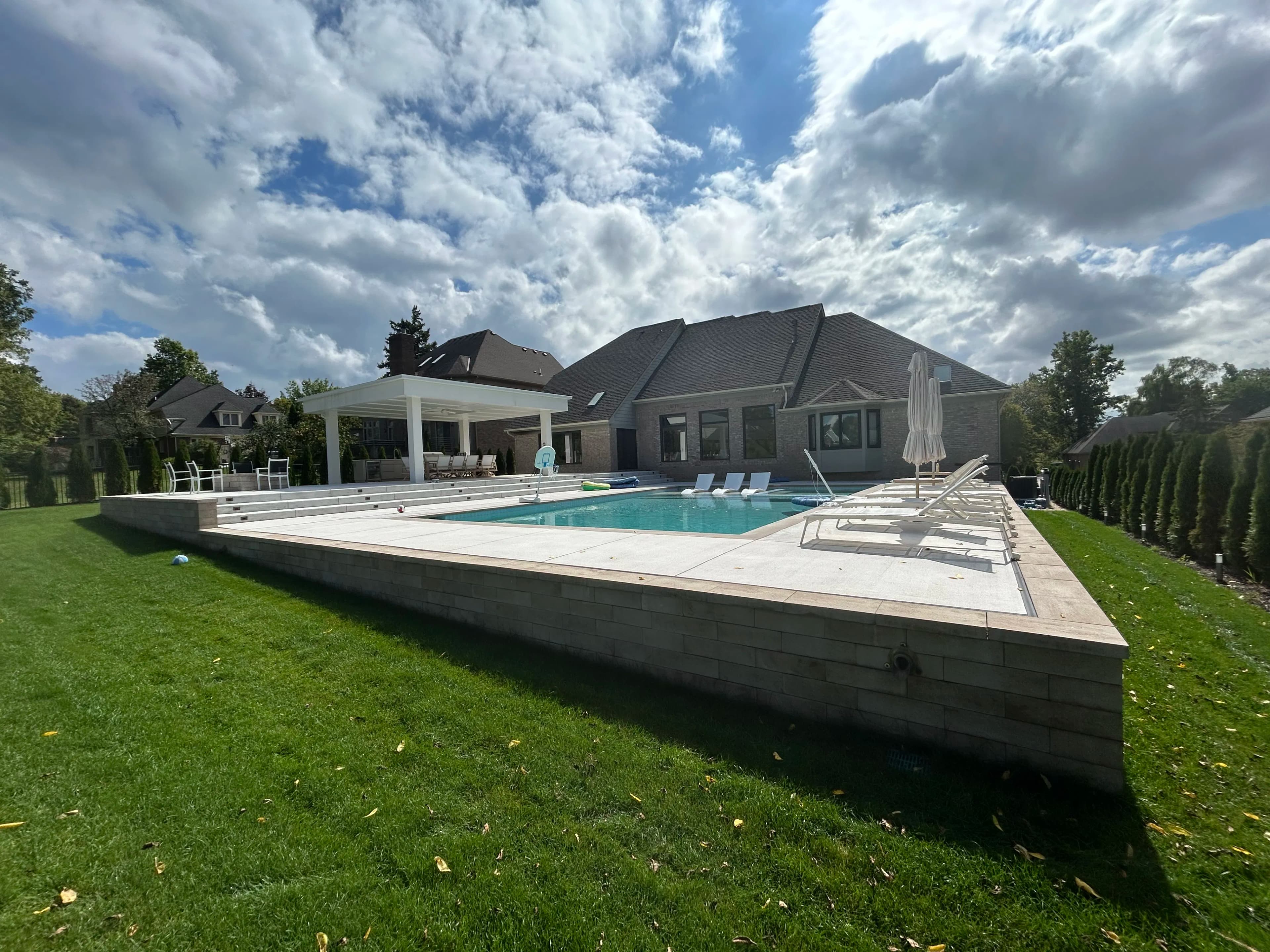 Project Gunite Pool, Retaining Wall, and Fire Pit Build in Farmington Hills image