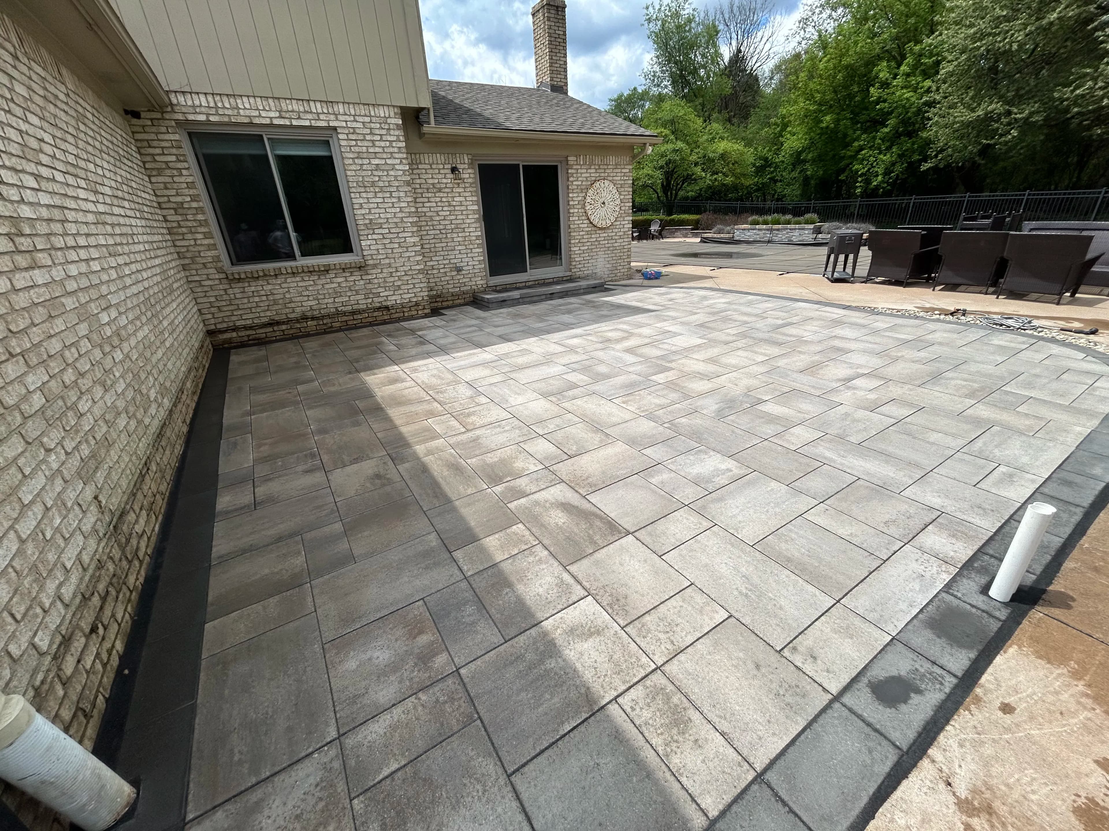 Project New Paver Patio Built for Real Backyard Living in Northville image