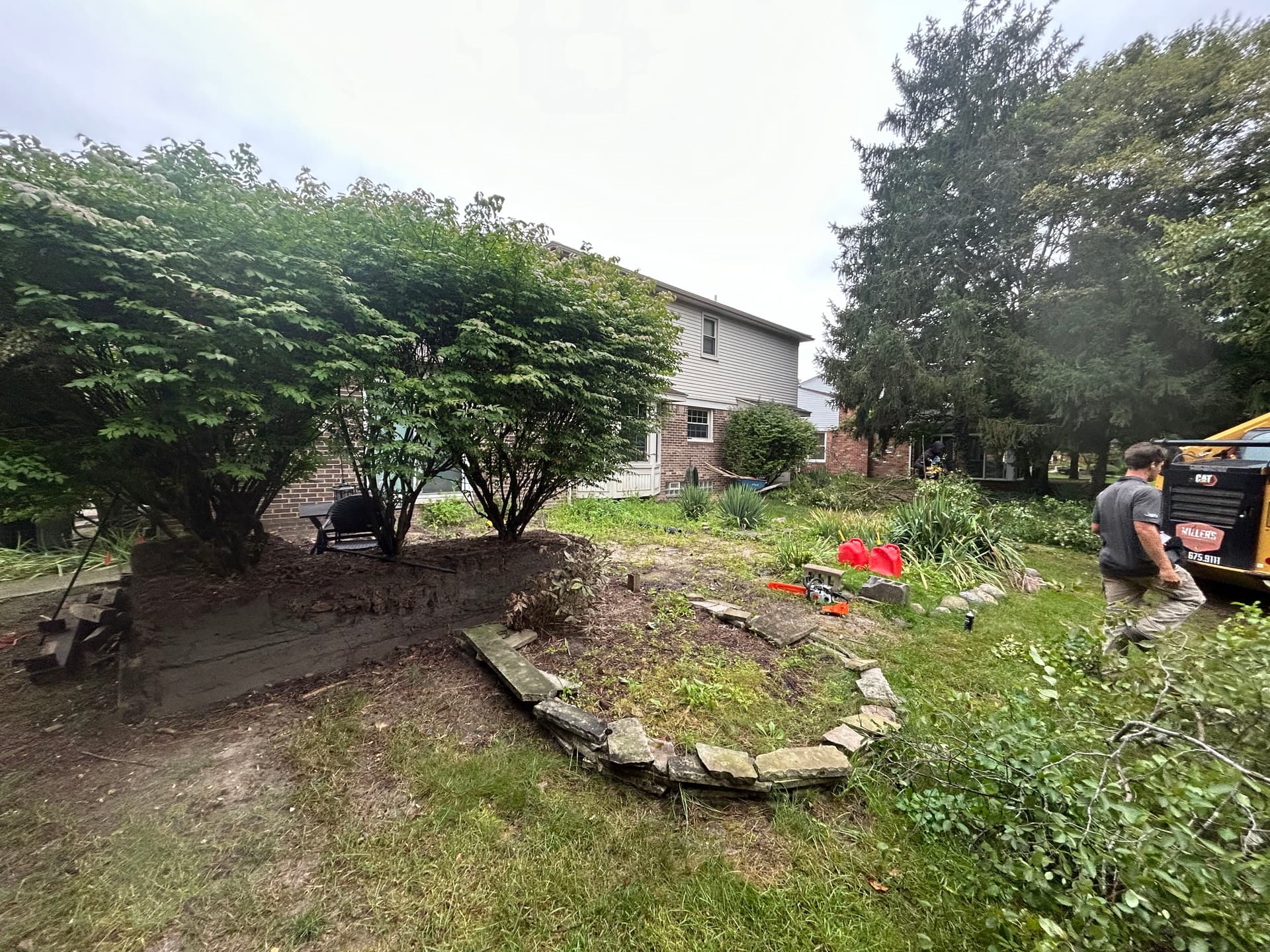 Plymouth Backyard Gets a Paver Patio Fire Pit and Fresh Landscape image