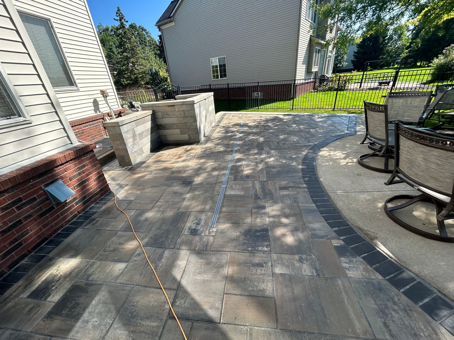 Gallery photos for Paver Patio With Retaining Walls and Outdoor Lighting in South Lyon: Image #1