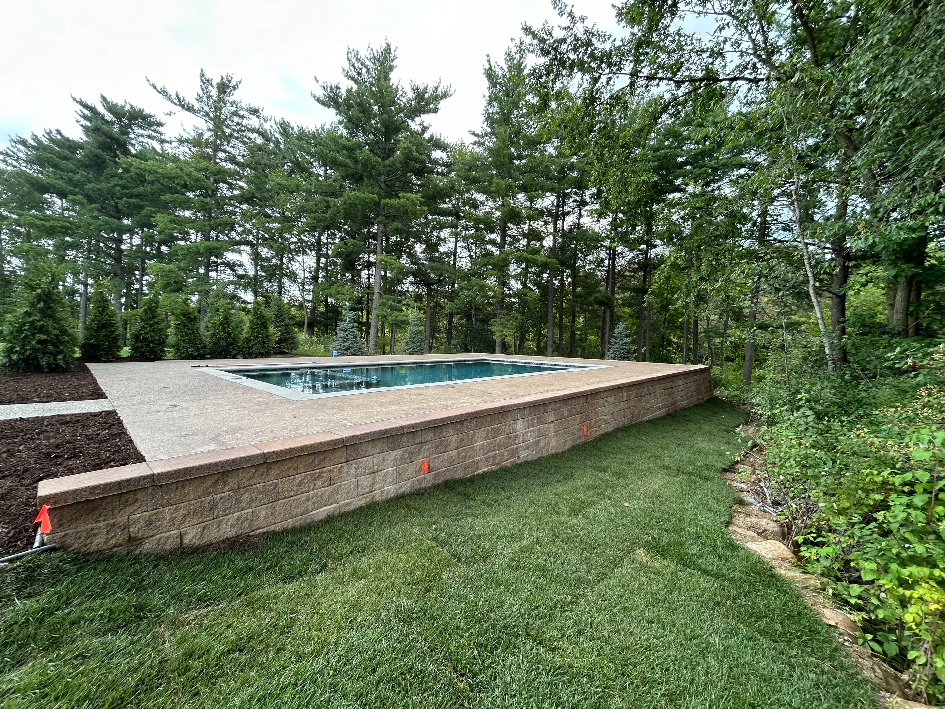 Project Pool Install with Retaining Wall and Landscaping in South Lyon image