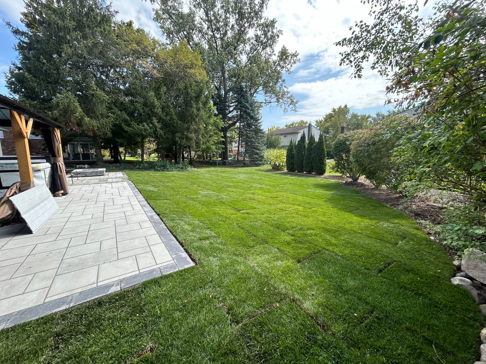 Gallery photos for Plymouth Backyard Gets a Paver Patio Fire Pit and Fresh Landscape: Image #2