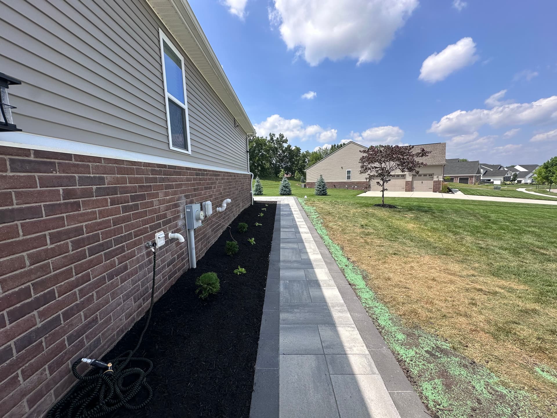 Gallery photos for Paver Patio Installation That Put This South Lyon Backyard to Work: Image #1