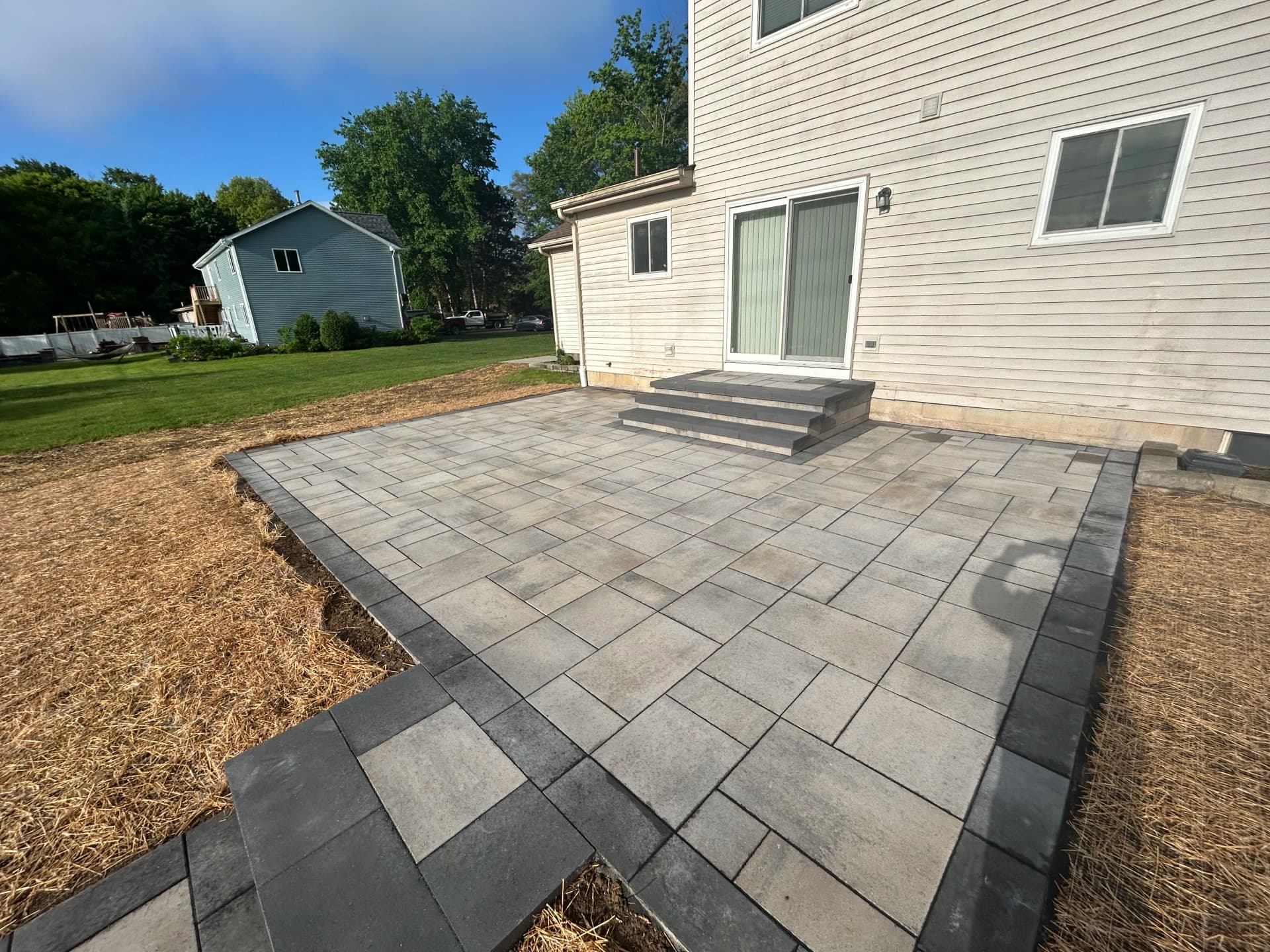 Gallery photos for Old Deck Gone, Paver Patio and Fire Pit Built in Brighton MI: Image #1