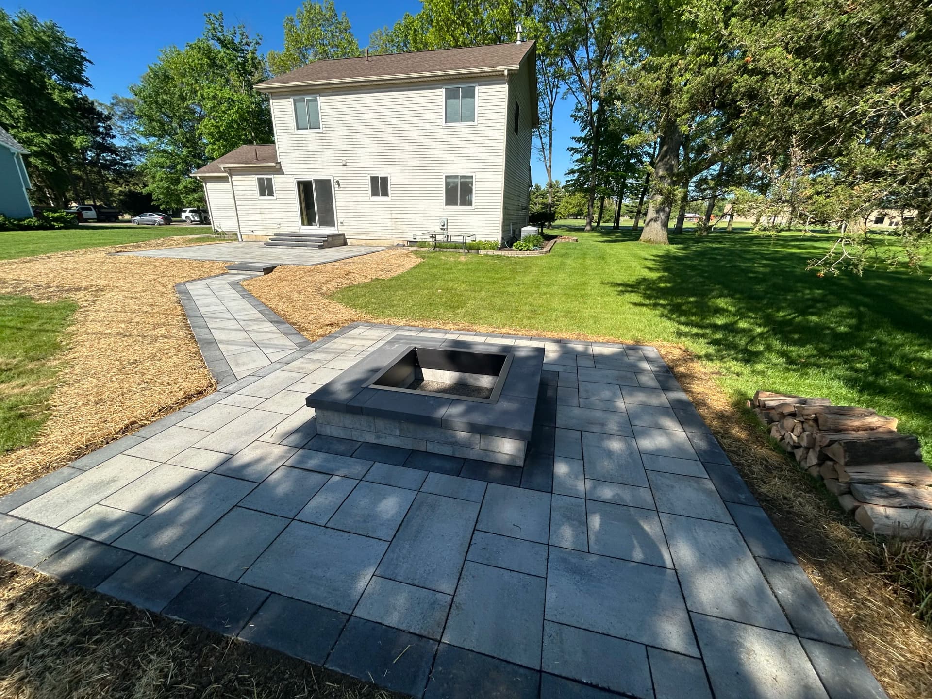 Gallery photos for Old Deck Gone, Paver Patio and Fire Pit Built in Brighton MI: Image #2