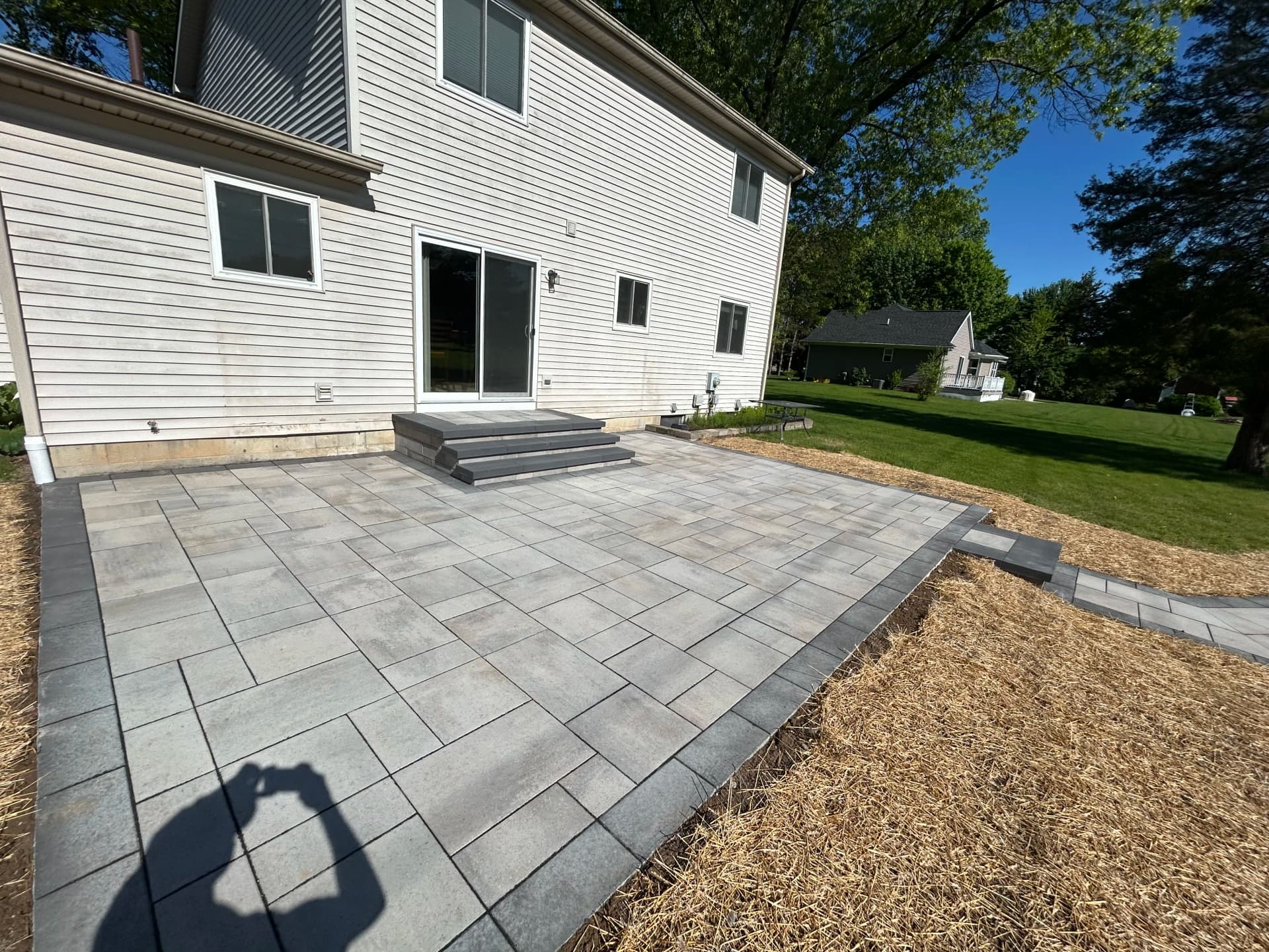 Old Deck Gone, Paver Patio and Fire Pit Built in Brighton MI image