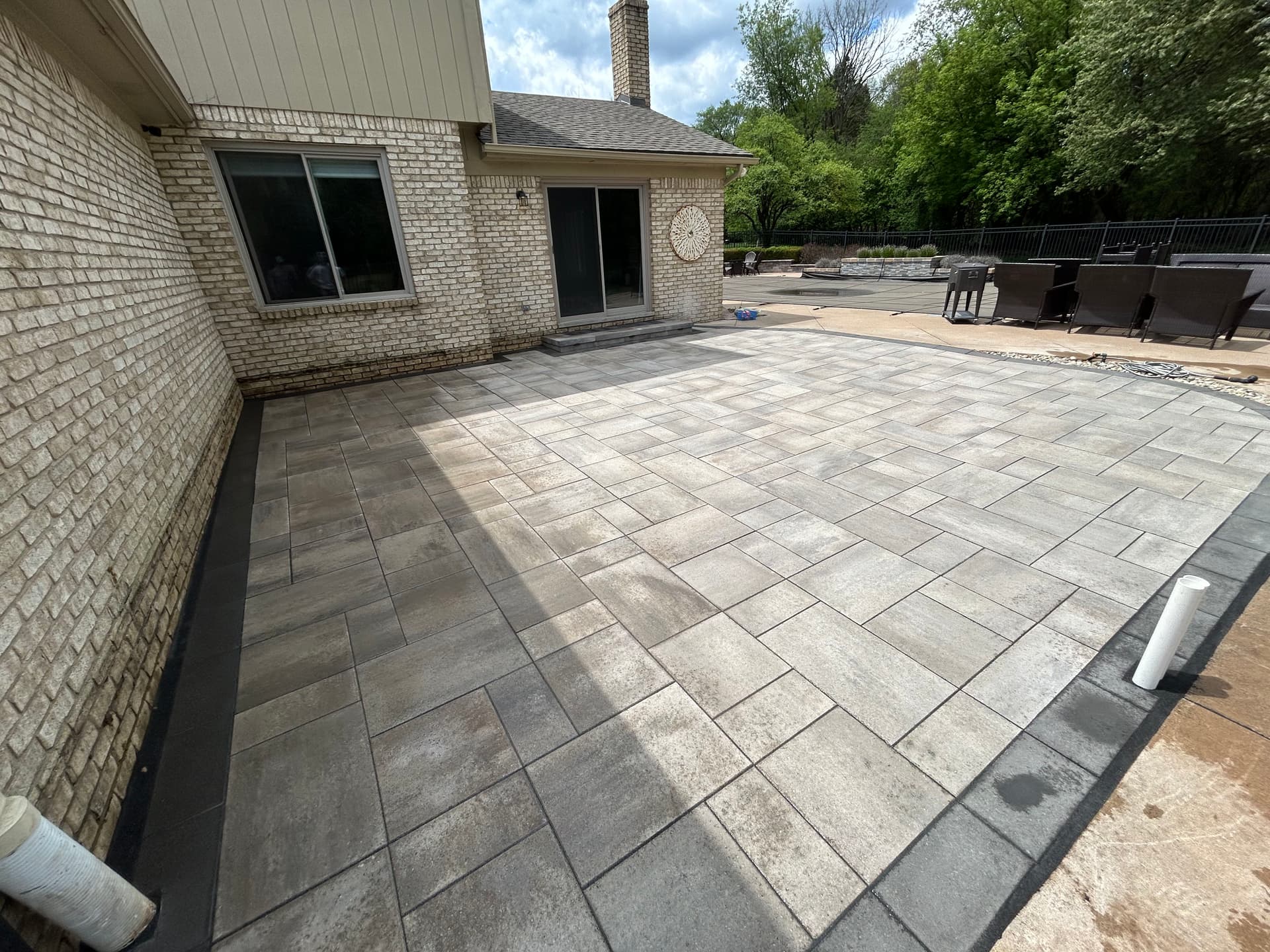New Paver Patio Built for Real Backyard Living in Northville image