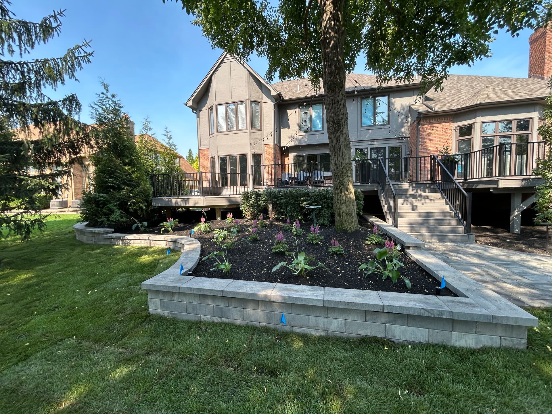Gallery photos for Backyard Overhaul with Pavers, Retaining Walls, and Full Landscape Install: Image #4