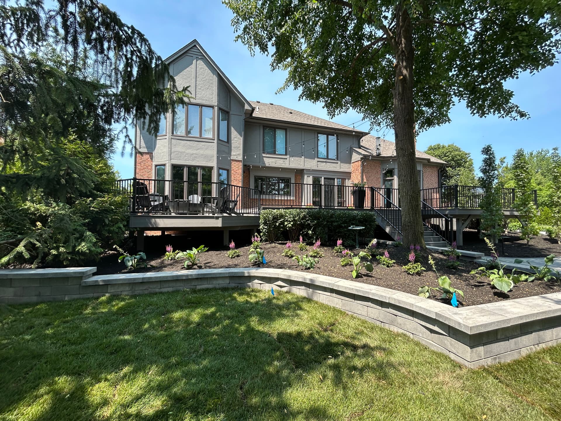 Gallery photos for Full Backyard Overhaul with Pavers, Retaining Walls, and Landscaping in Troy: Image #2